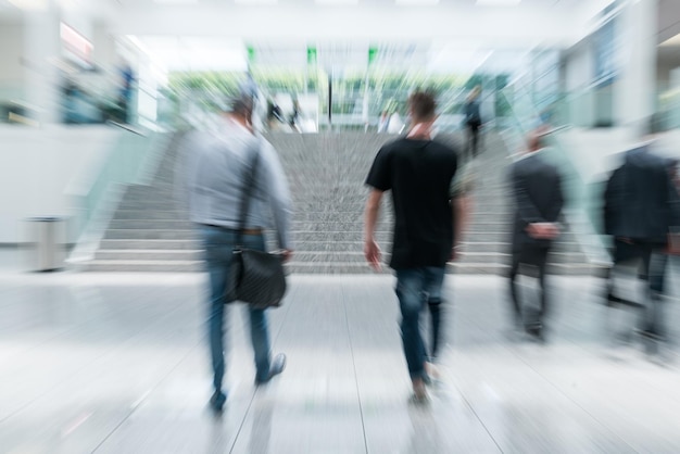 Blurred people at a trade fair