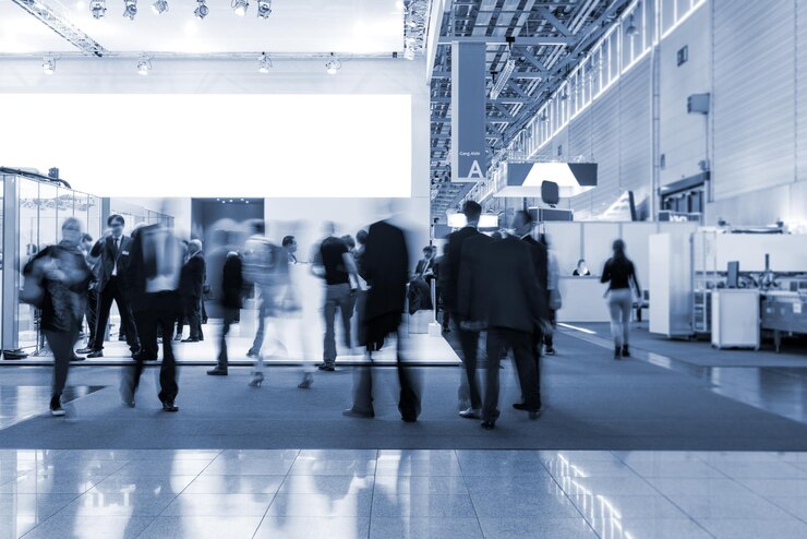 Blurred people at a trade fair