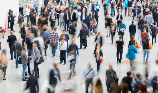 Blurred people at a trade fair