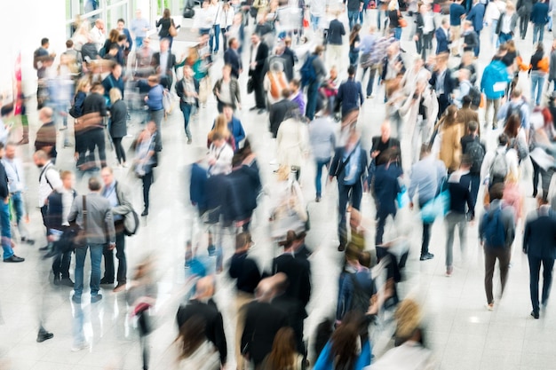 Blurred people at a trade fair