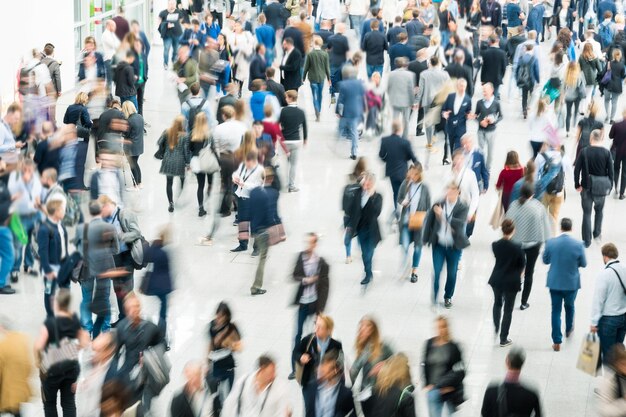 Blurred people at a trade fair