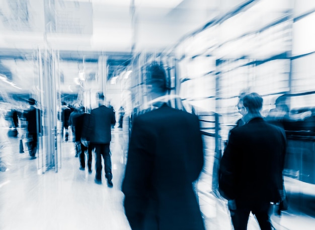 Blurred people at a trade fair