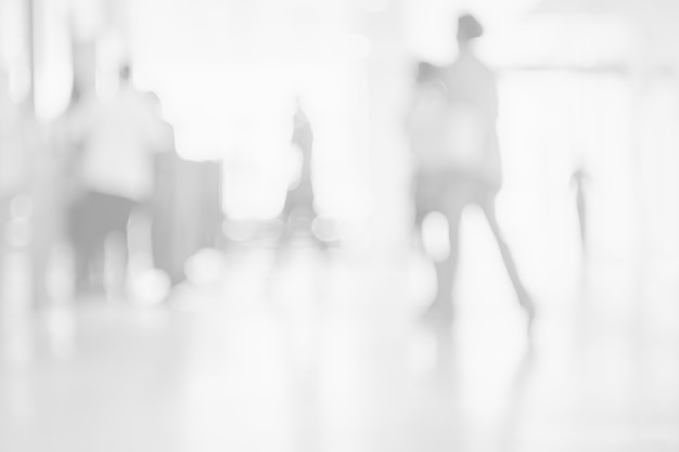 Blurred people walk onpathway Abstract white grey background for backdrop design