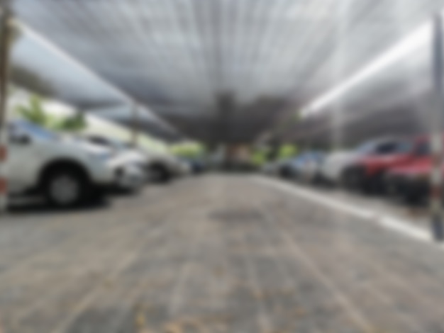 Photo blurred photo of cars in the parking lot,cars parked in the parking lot