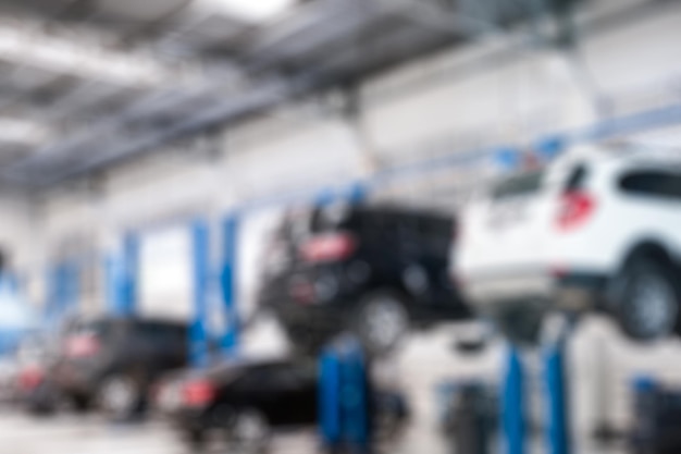 Photo blurred scene cars lifting repair check and fix a problem