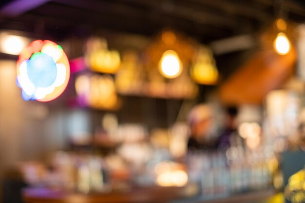 Blurred scene counter bar with light in coffee shop