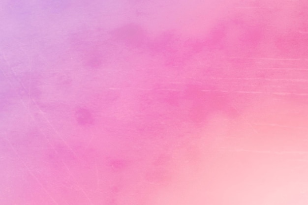 Blurred vintage pink gradient background with spots and scratches