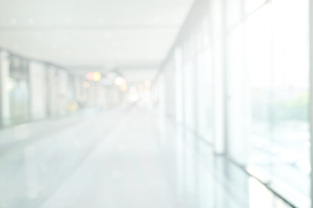 Blurred wall interior view looking to lobby and entrance doors Perspective Building Hallway