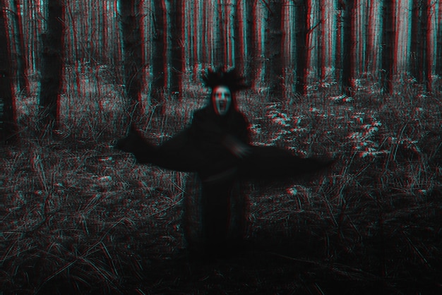 Blurry frightening black silhouette of an evil witch. Black and white with 3D glitch virtual reality effect