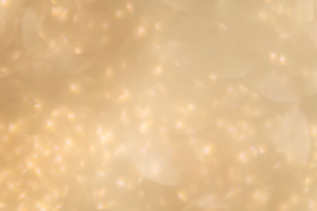 Photo blurry golden glitter background texture