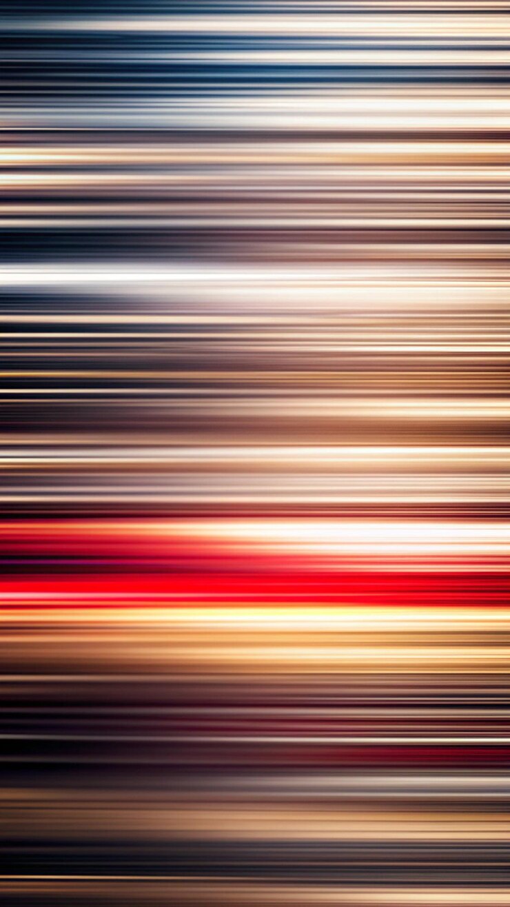Photo a blurry image of a red and yellow light