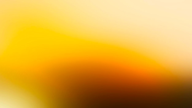 a blurry image of a sunset with a yellow background.