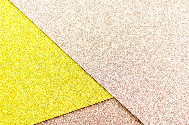 Blush pink and yellow shiny glitter paper background abstract and holiday backdrop