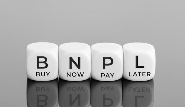 BNPL text on white blocks shape Buy now pay later concept Copy space