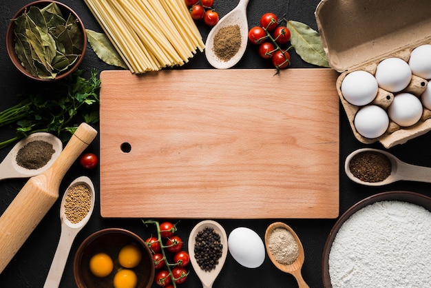 Board amidst cooking ingredients