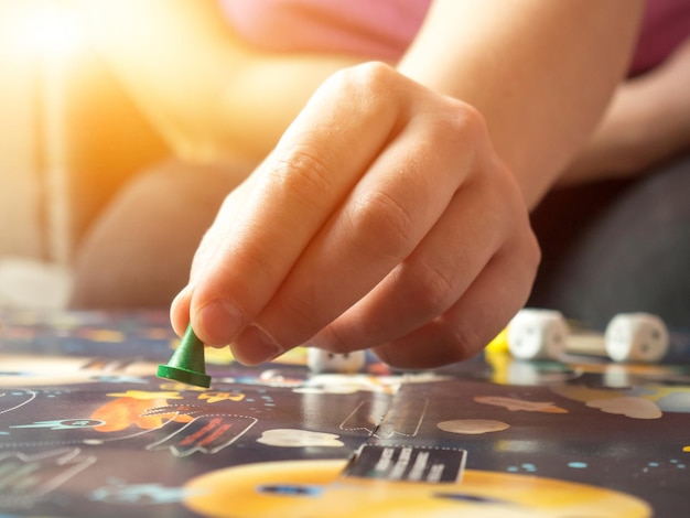 Photo board games concept. dice, chips and cards on the background of the playing field copy space