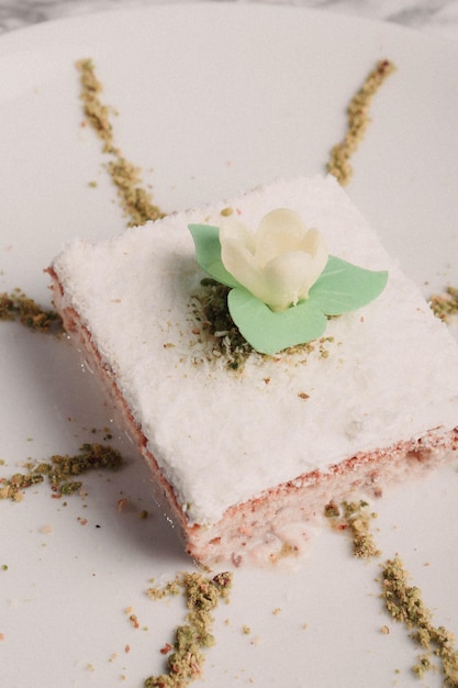 Board with delicious cake on table