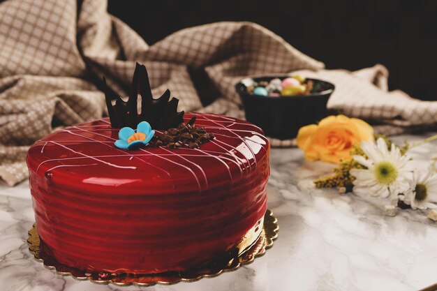 Board with delicious cake on table