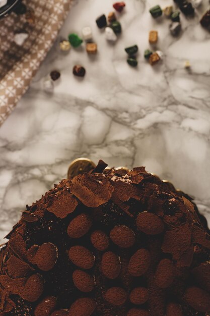 Board with delicious cake on table