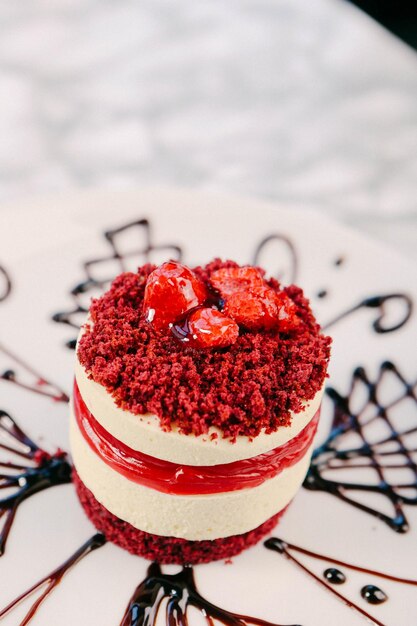 Board with delicious cake on table