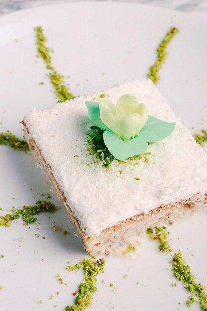 Photo board with delicious cake on table