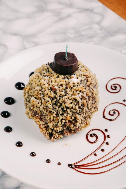 Board with delicious cake on table