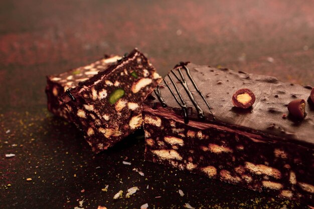 Board with delicious cake on table