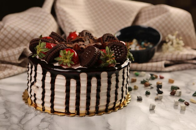 Board with delicious cake on table