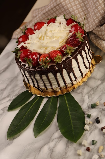 Board with delicious cake on table