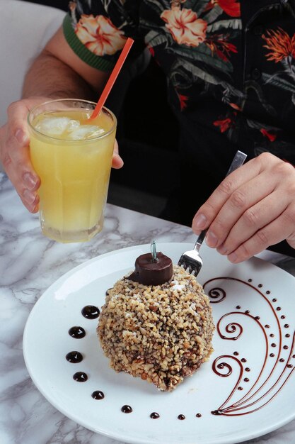 Board with delicious cake on table