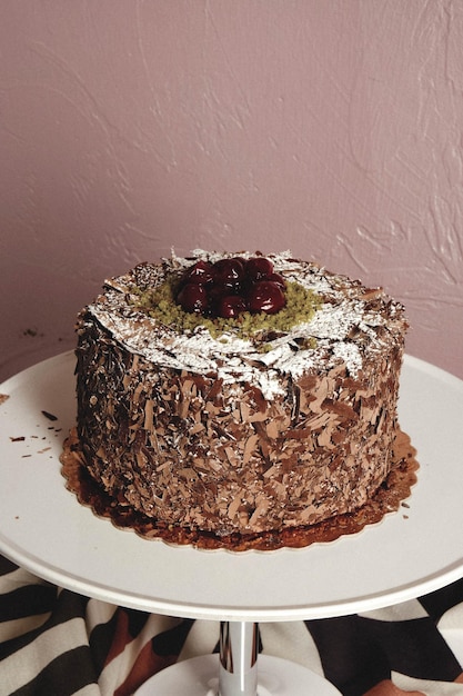 Board with delicious cake on table