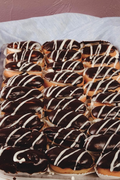 Board with delicious cake on table