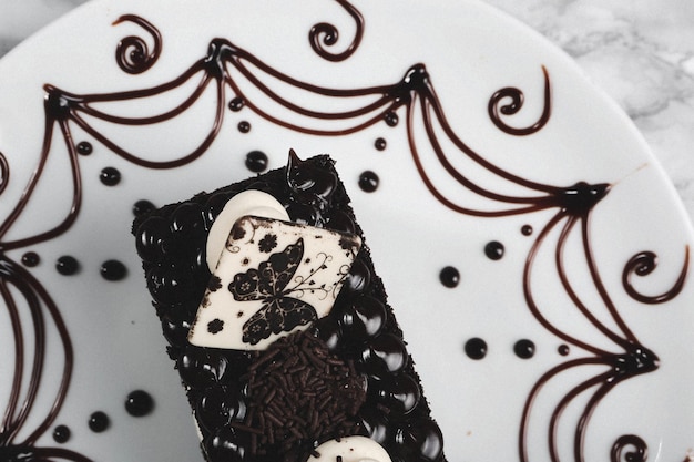 Board with delicious cake on table