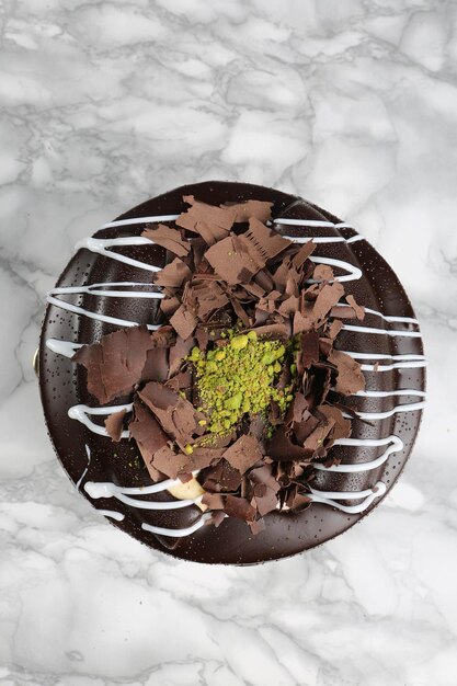 Board with delicious cake on table