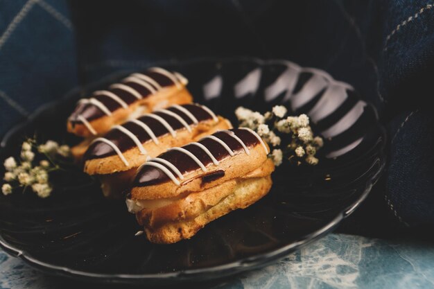 Board with delicious cake on table