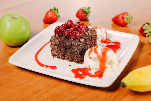 Board with delicious cake on table