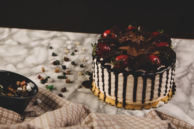 Board with delicious cake on table