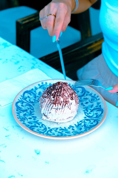 Photo board with delicious cake on table