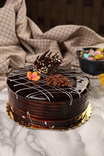 Board with delicious cake on table