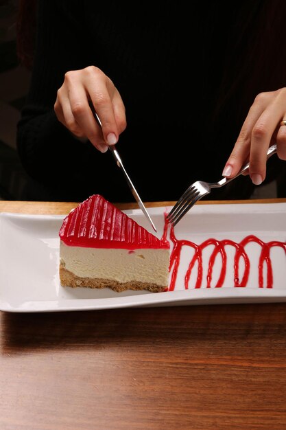 Photo board with delicious cake on table