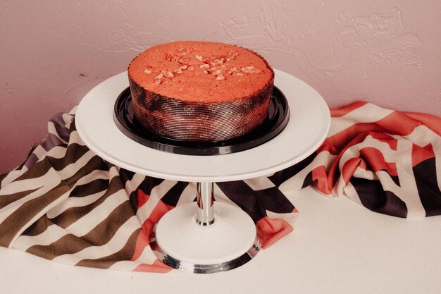 Photo board with delicious cake on table