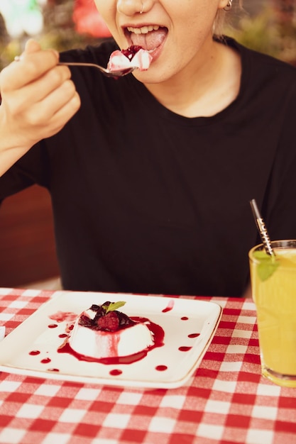 Board with delicious cake on table