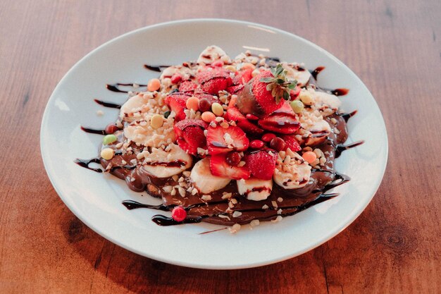 Board with delicious cake on table