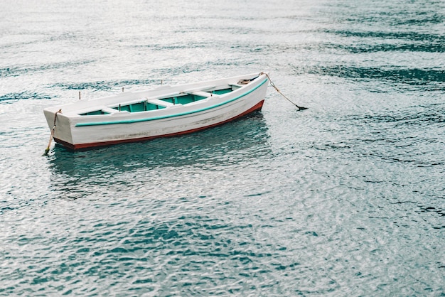 Boat in blue sea water