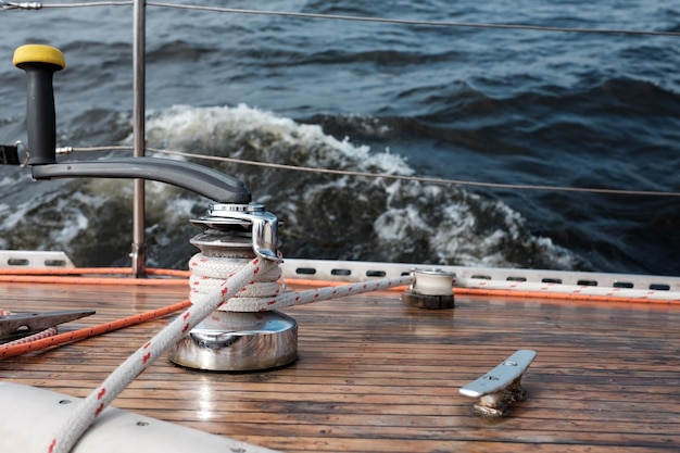 Boat bow sailing in blue Mediterranean sea in summer vacation