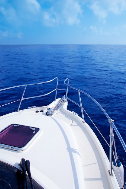 Boat bow sailing in blue Mediterranean sea