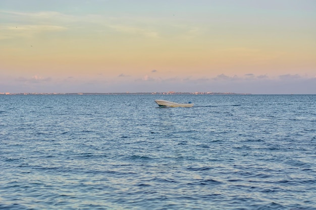 The boat in the Caribbean Sea on a sunny day Clear water