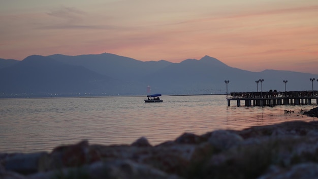 Boat going fishing at sunset