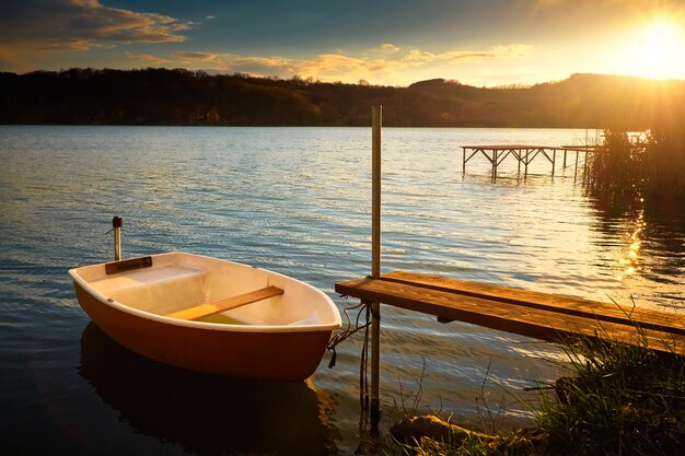 Boat on lake near pier