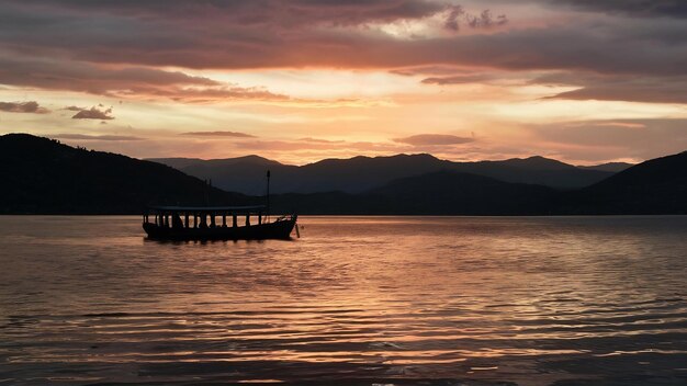 Boat in lake sunset